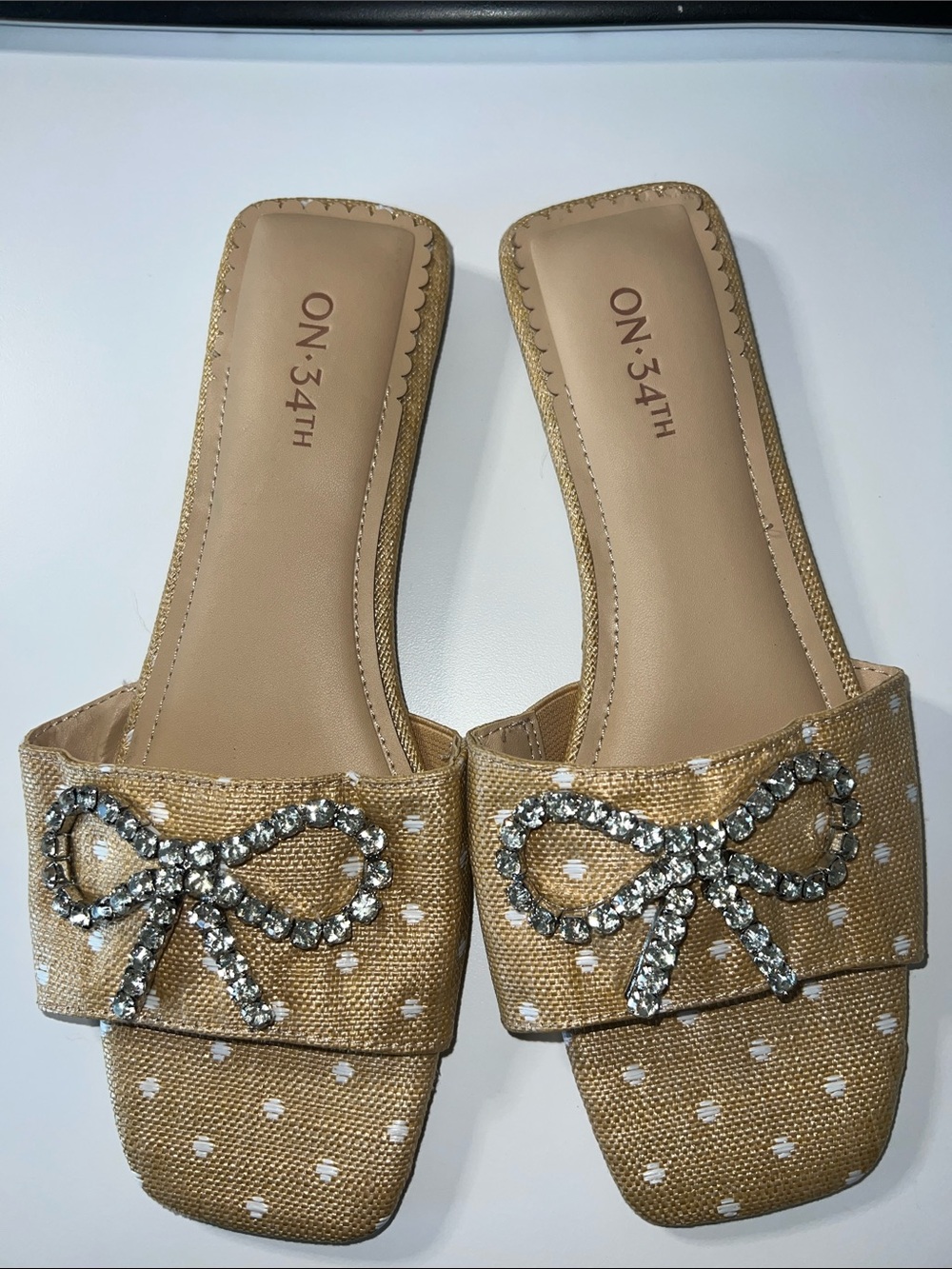 Textile slide sandals, ON 34th Jazziee, beige polka dot with rhinestone bow